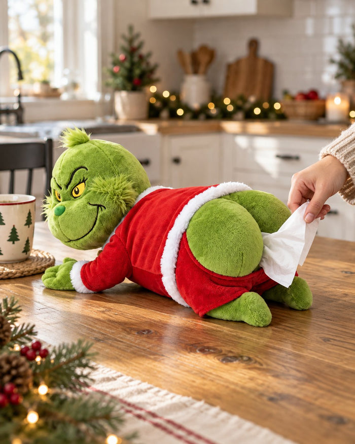 A hand pulling a tissue from the plush's rear