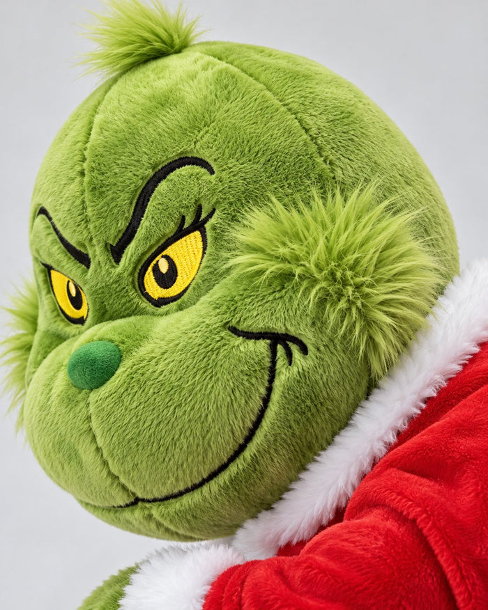 Close-up of the soft plush face and the red suit