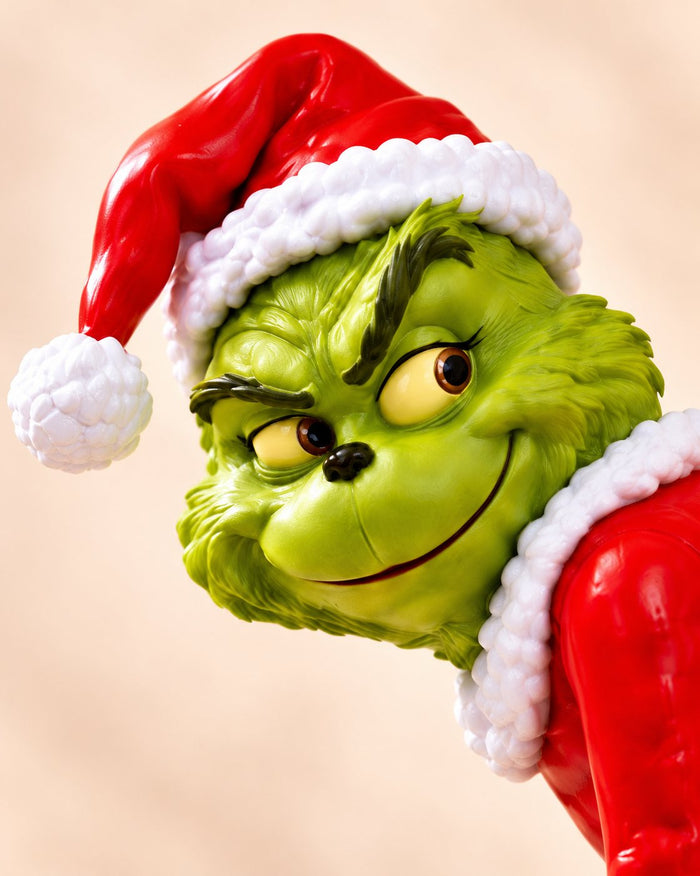 Close-up of the dispenser's face and Santa hat
